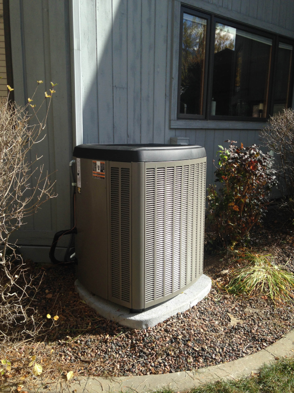 Lennox condenser corner of house install