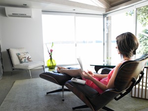 Mitsu indoor ductless ac-reclining woman