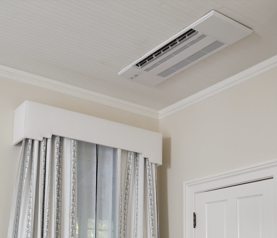 an indoor hvac unit on a ceiling of a room