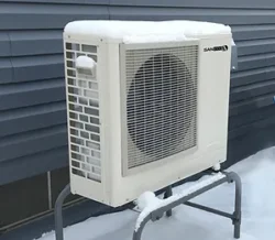 SANCO2 heat pump water heater-condenser and snow