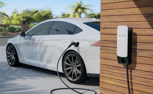 an electric car plugged into a span electrical panel