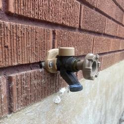 freeze-proof hose spigot installed - Woodford