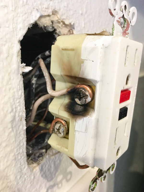 a burnt out gfci electrical outlet