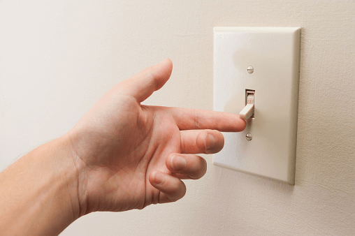 Light switch and hand 