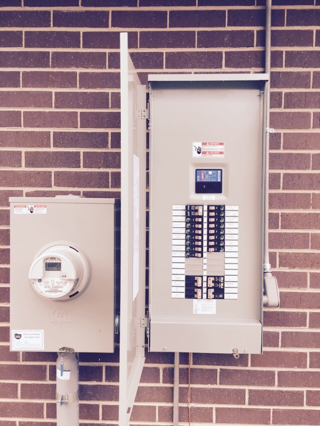 electrical panel on a brick wall